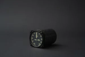 Analogue flight gauge with VZAD VPŘED markings and speed scale