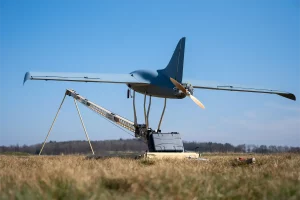 Rear view of autonomous UAV on field catapult launcher