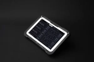 Angled view of rugged tablet running autonomous navigation software for UGV fleet monitoring