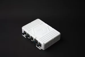 Side view of white predictive diagnostics unit showcasing robust construction and multi-port interface