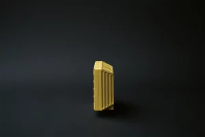 Side view of a compact display driver unit with vertical finned casing for thermal efficiency