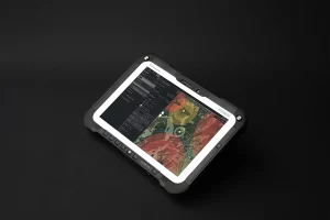 Rugged tablet displaying UAV Mission Planner software with route and no-fly zones