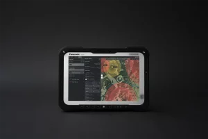 Front-facing rugged tablet running UAV Mission Planner with route and hazard zones