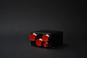 Mission computer with sealed connectors protected by red caps