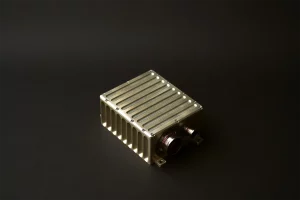 Angled perspective of stores management system unit showing metal housing and connectors