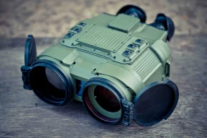 Military-grade thermal imaging binocular with multiple lens modules and protective lens caps