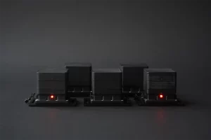 Group of AMODIS vibration sensors with illuminated status LEDs indicating live operation